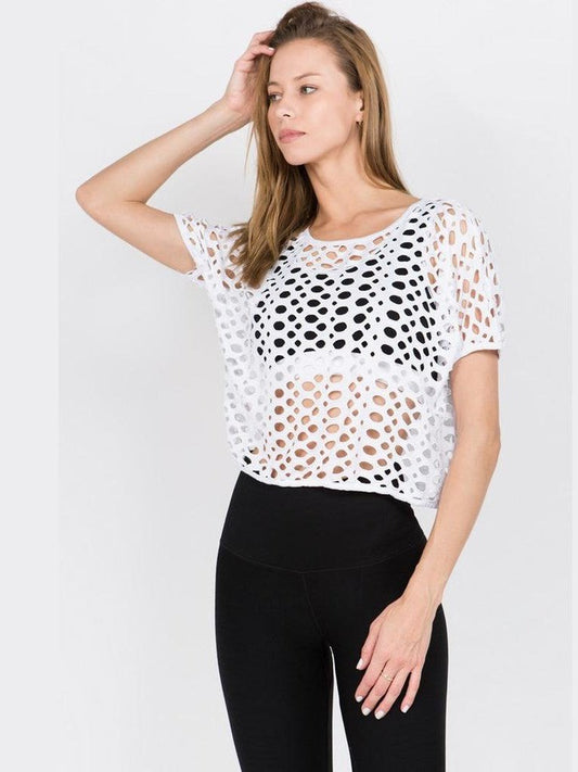 White crop top. Perfect for layering over a sports bra or tank tank, whether at the gym or running errands! Cool and light. Short-sleeved, loose-fit, pullover style